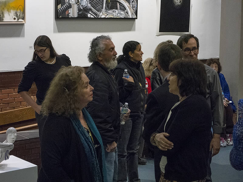 Artists and members of the NCC community mingle at the 2015 Art Faculty Show