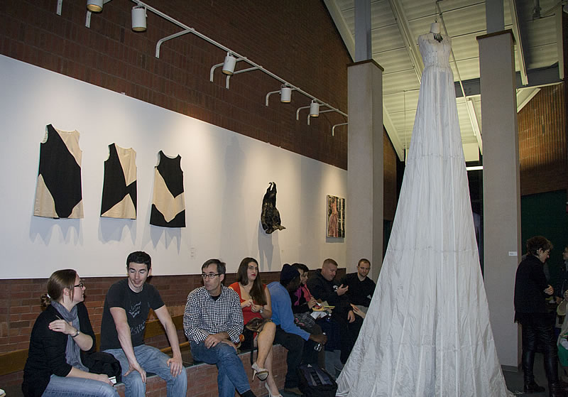 Professor Joe Fucigna with students at the opening reception for Dress Stories
